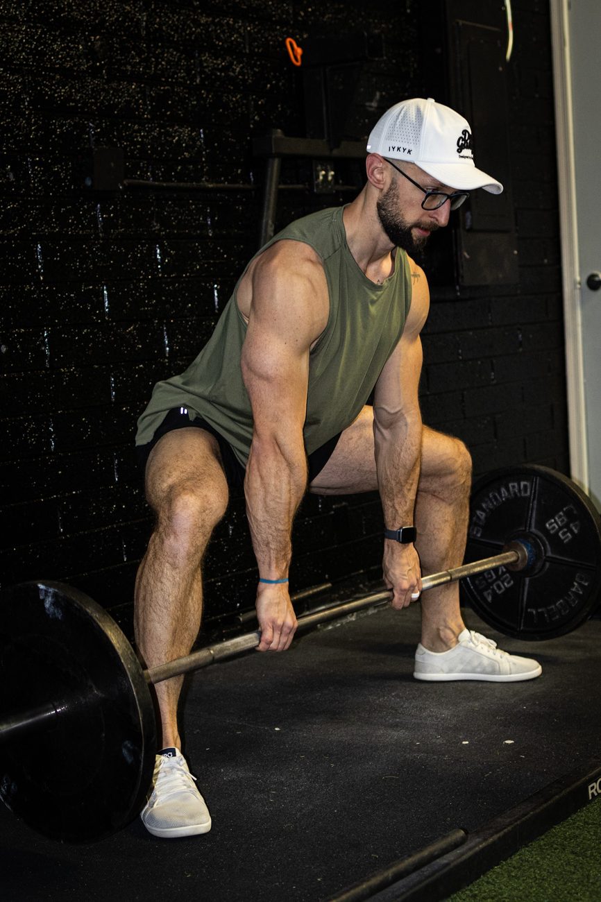David performing a sumo deadlift