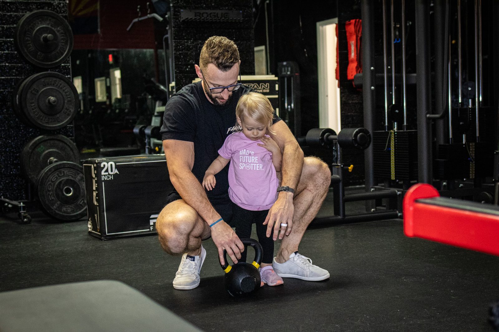 David and his daughter with a kettlebell