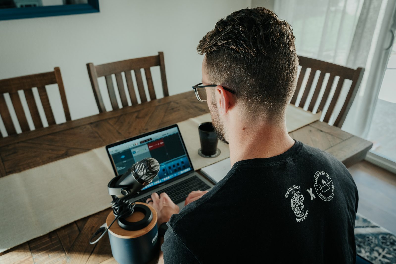 David recording the podcast on his laptop
