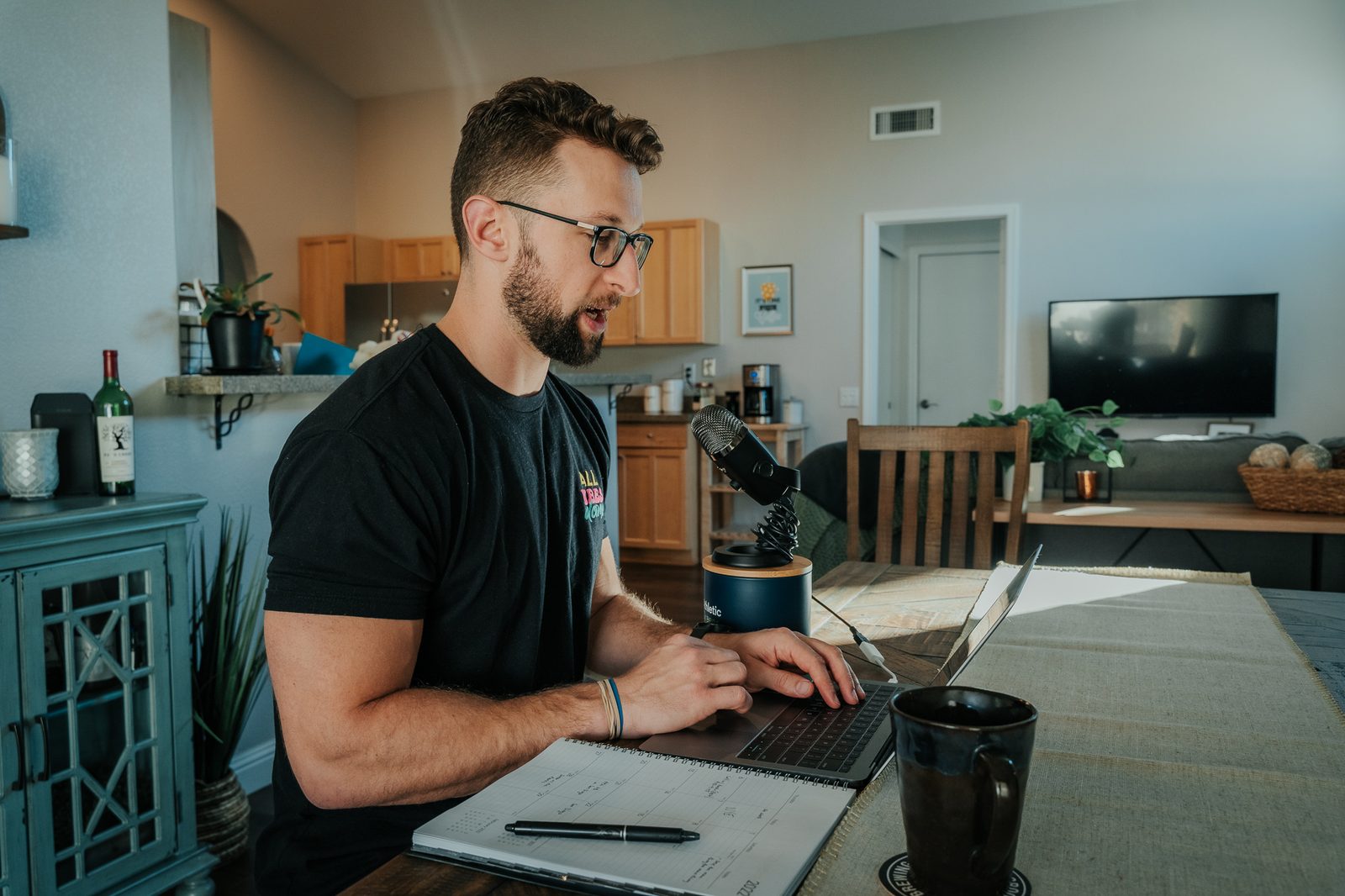 David editing the podcast